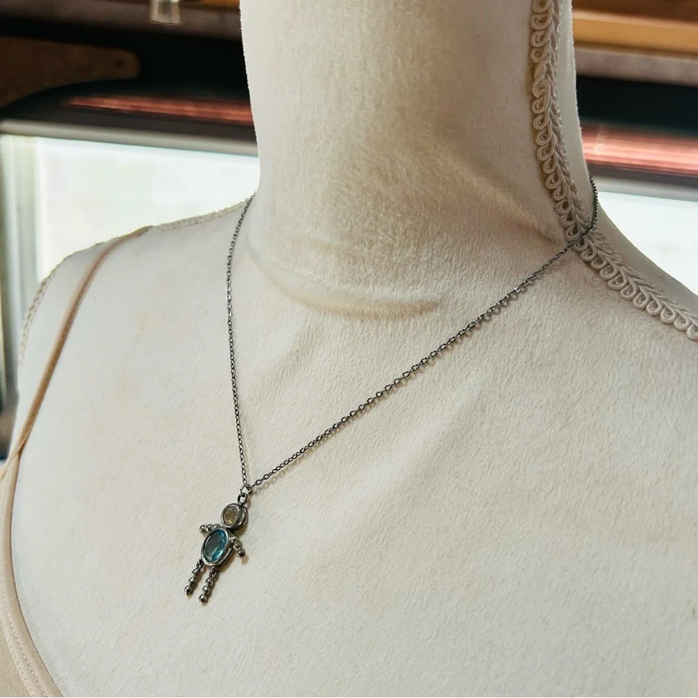 Vintage articulated leg crystal man pendant on chain necklace